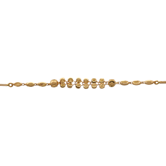 Slim Gold Bracelet with Dangling Disc Motifs