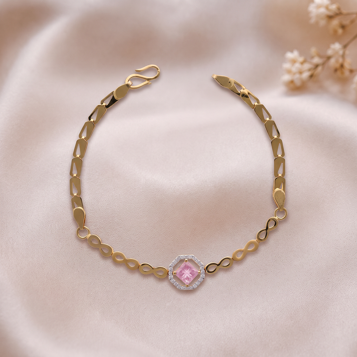 Gold Link Bracelet with Pink Centre Stone