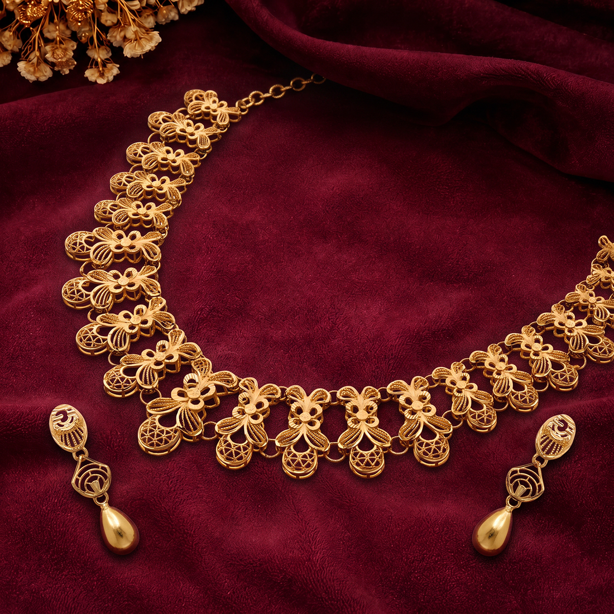 Gold Collar Necklace with Repeating Motifs