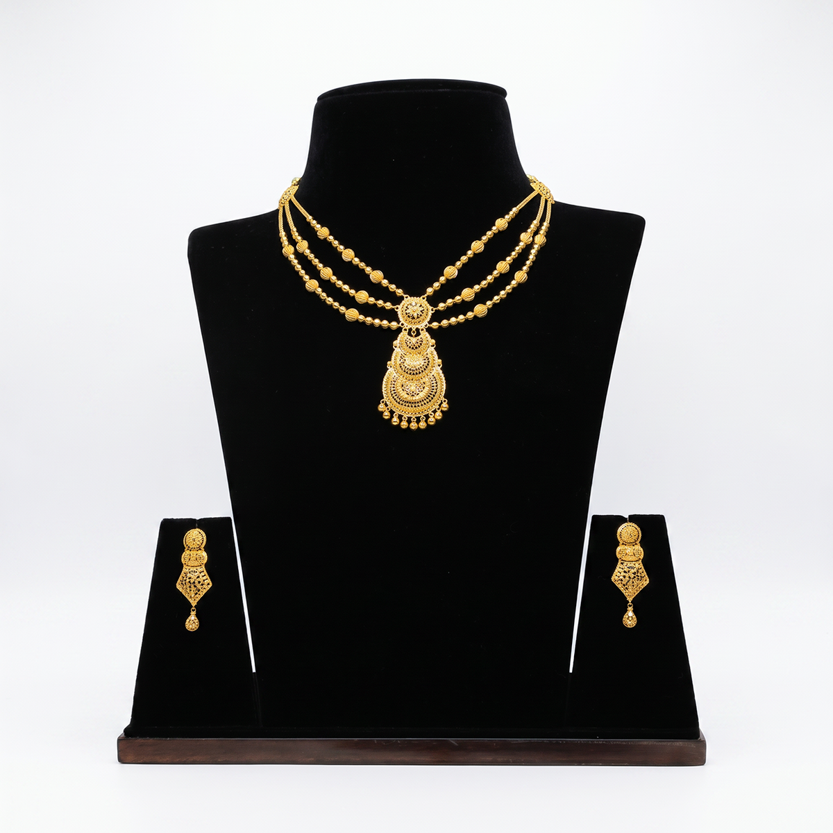 Multi-Strand Gold Necklace with Central Pendant